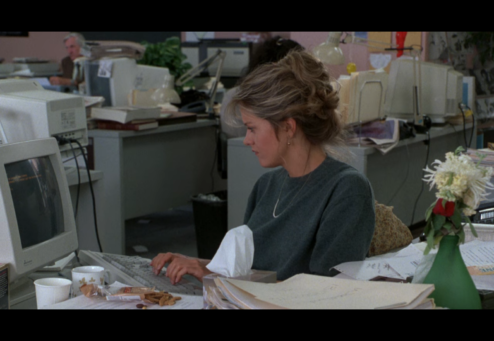 ©TriStar Pictures 1993 — Annie played by Meg Ryan typing in a computer