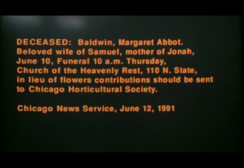 Computer screen showing an obituary for Samuel Baldwin's wife.
